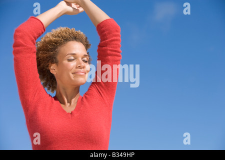 Young woman posing outdoors Stock Photo