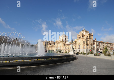Plaza Zorrilla Valladolid Spain with fountains and statue of José Zorrilla with the Academia del Arma de Caballería Academy Stock Photo
