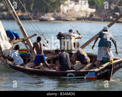Kenya, Coast Province, Lamu Island. Action stations rounding a buoy off Lamu Island! This photograph shows a mashua competing in Stock Photo