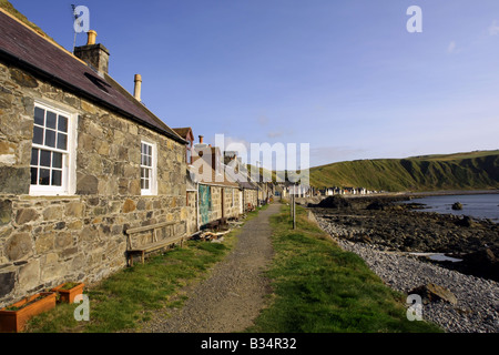 Former fishing village and harbour of Crovie on the north coast in Aberdeenshire, Scotland, UK Stock Photo