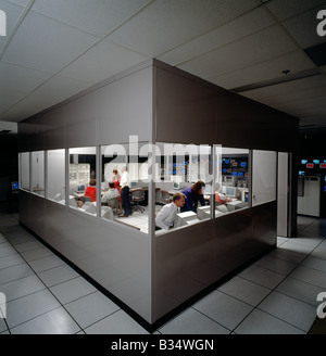 Workers in a laboratory used to test new computer equipment operability Stock Photo