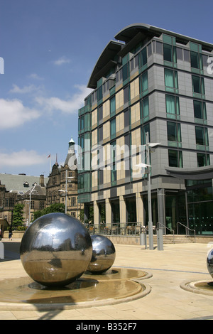 City of Sheffield, England. The Colin Rose ‘Images of Rain’ steel sculpture water fountain in Sheffield’s Millennium Square. Stock Photo