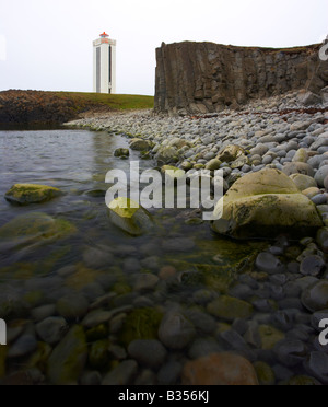 A view of the Art Deco lighthouse at Kalfshamarsvik on the West Coast of the Skagi Peninsula of Iceland Stock Photo