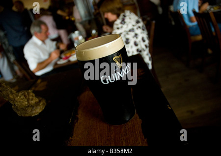 Pint of Guinness served in the bar at the Pier Head in Kinvara, County Galway, Ireland Stock Photo