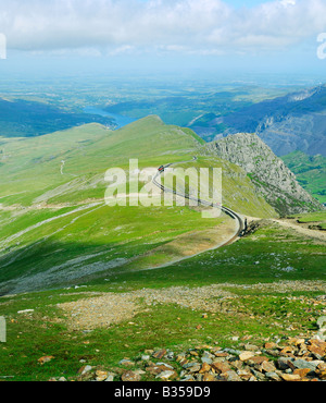 Looking down llanberis path towards Clogwyn railway station on the Snowdon Mountain Railway overlooking Llanberis Pass Stock Photo