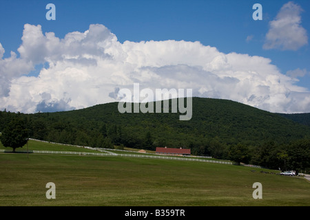 Horse barn and corral in the rolling hills Stock Photo