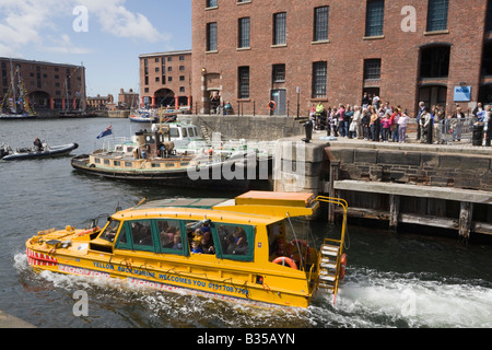 Liverpool Merseyside England UK Yellow Duckmarine by Edward Pavilion Albert Dock with people visiting Tall Ships race Stock Photo