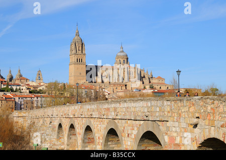 Roman Bridge Puente Romano with the New and Old Cathedrals Catedral Nueva Vieja Salamanca Spain Stock Photo