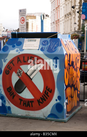 A knife bin stands on one of London's streets. Stock Photo