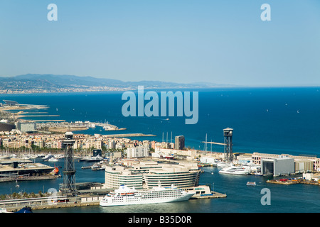 SPAIN Barcelona Aerial view of coast of Mediterranean Sea cruise ships docked in port buildings and beaches along shore Stock Photo