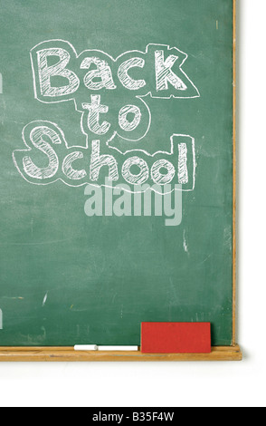 Old chalkboard isolated on white with the phrase Back to school written on it Stock Photo