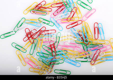 Multi - colored paper clips on a white background Stock Photo