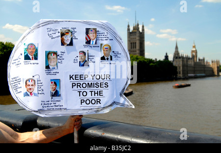 Campaigners protest to highlight G8 broken promises on African aid and debt, climate change and response to HIV and AIDS, UK Stock Photo