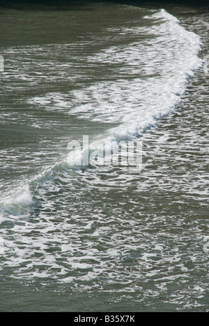 Wave breaking on beach, Salcombe, Devon, UK Stock Photo