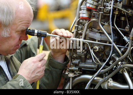Engine of air jet and mechanic repairing it Stock Photo - Alamy