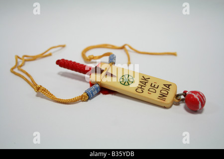 Bat Raksha Rakhi or wrist band with Cricket bat and ball theme given by sister to ...