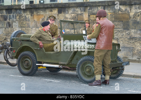 1940 Jeep Wartime American army vehicle and people at Pickering Living History 1940s World War II Wartime War Weekend, North Yorkshire, England, UK Stock Photo