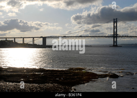 The Forth Road Bridge Silhouetted against late afternoon spring skies. Stock Photo