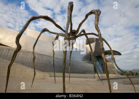 Spider sculpture called Maman by Louise Bourgeois in front of Museum Museo Guggenheim in Bilbao Basque Country Spain Stock Photo