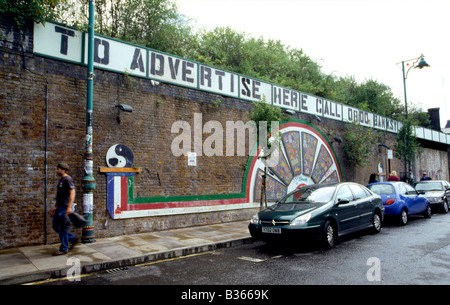 graffiti stencil by Banksy in East London Stock Photo