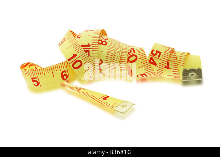 Yellow tape measure on white background Stock Photo