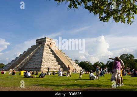 Tourists Viewing El Castillo Pyramid Of Kukulcan "The Castle" During ...