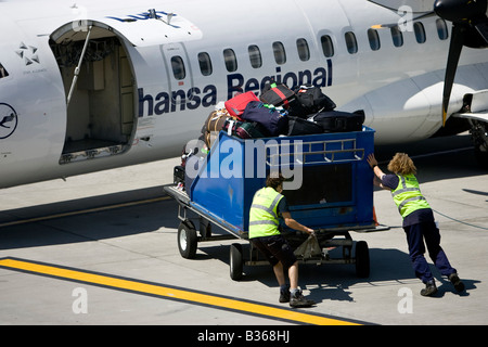 airport lufthansa regional luggage baggage handler moving side air jersey british alamy similar islands channel