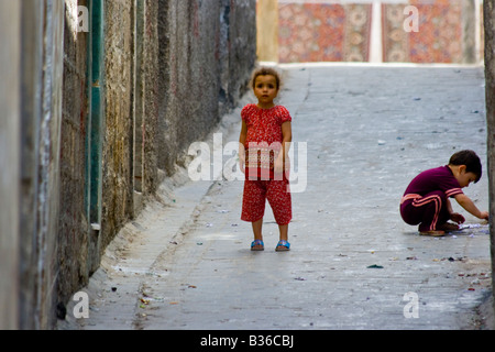 Young Children Playing in the Streets of the Old City in Aleppo Syria Stock Photo