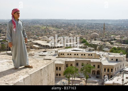 Young Syrian Looking over Aleppo Syria from the Walls of the Citadel Stock Photo