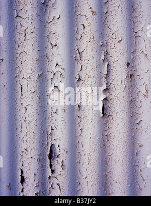 Flaky paint on corrugated iron, Dalmally, Argyll, Scotland, UK. Stock Photo