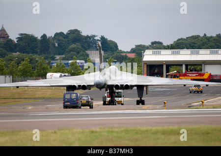 Restored Avro Vulcan being towed taxiing before flying display Farnborough Air Show 2008 Stock Photo