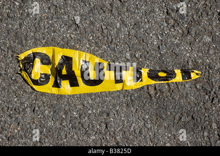 Close up of a caution sign on the street Stock Photo