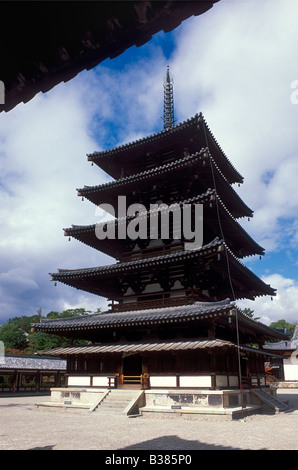 Interior courtyard and uniquely shaped five story pagoda of Horyuji Temple near Nara the oldest wooden buildings in Japan Stock Photo