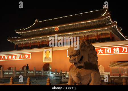 A stone sculpture of a loin at night outside the Tiananmen Gate, The Forbidden City, Beijing, China. Stock Photo