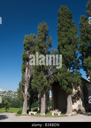 The Notre Dame des Cypres chapel with the village of Fayence in the background, Var, France Stock Photo