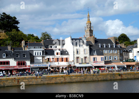 Colourful shop fronts on the harbour front at Binic a popular tourist resort in northern Brittany, France Stock Photo