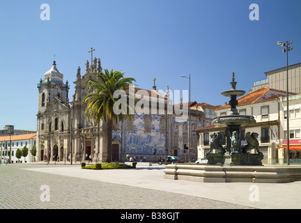 Portugal Oporto, the Igreja dos Carmelitas church covered with azulejos tiles and a baroque fountain ( chafariz ) Stock Photo