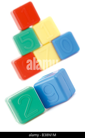 Children's Plastic Building Blocks with Numbers on a White Background Stock Photo