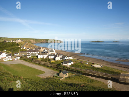 Early evening and the sun is setting over Aberdaron & Aberdaron Bay, Lleyn Peninsula, Gwynnedd, North Wales, United Kingdom Stock Photo