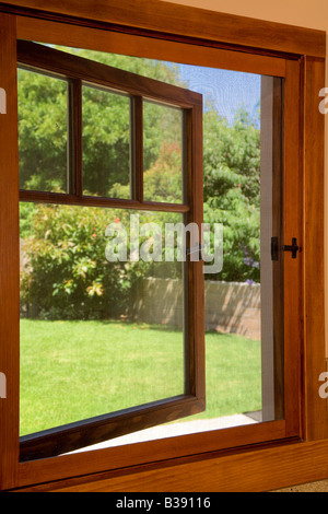 View to a yard from a small open window Stock Photo