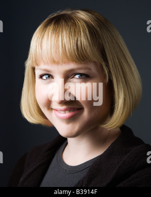 Portrait of young caucasian woman smiling Stock Photo