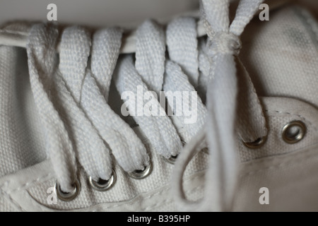 Laces on a Plimsoll shoe Stock Photo