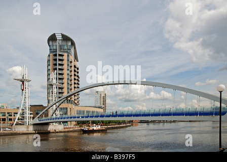 the millenium bridge and lowry centre on salford quays,manchester,england,uk Stock Photo