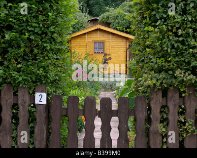 Wooden garden house in an allotment garden Stock Photo
