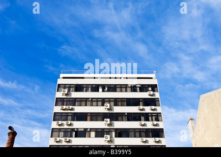 Building with lots of air conditioning units Stock Photo