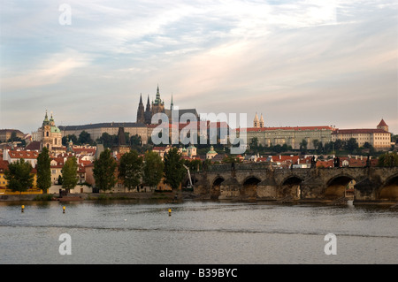 Prague Castle and Charles bridge as seen from the eastbank of river Vltava Stock Photo