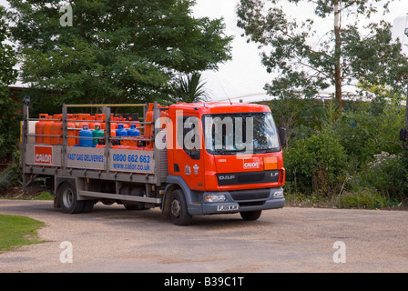 Propane and butane gas cylinders on lorry being delivered (calor) Stock Photo