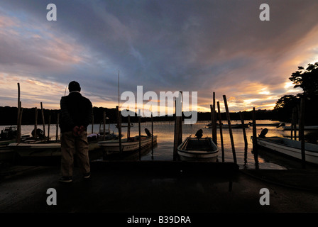 Fisherman and boats in Matsushima bay Japan Stock Photo