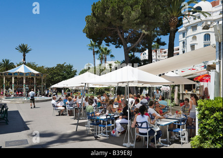 Cafe on the Promenade de la Croisette, Cannes, Cote d'Azur, Provence, France Stock Photo