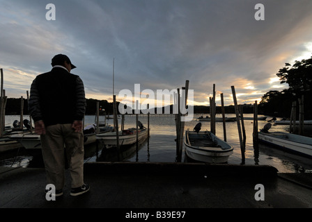 Fisherman and boats in Matsushima bay Japan Stock Photo